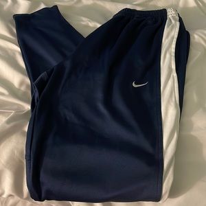 Nike team pant has #21 on front. Size small womens.